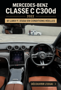 Vue élégante de la Mercedes-Benz C300d 2022 sur la route, mettant en avant son design moderne.