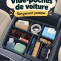 Boîte à gants d'une voiture de luxe bien organisée avec des essentiels visibles.