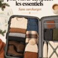 Une valise ouverte avec des vêtements chauds prêts pour un voyage en Europe en hiver.